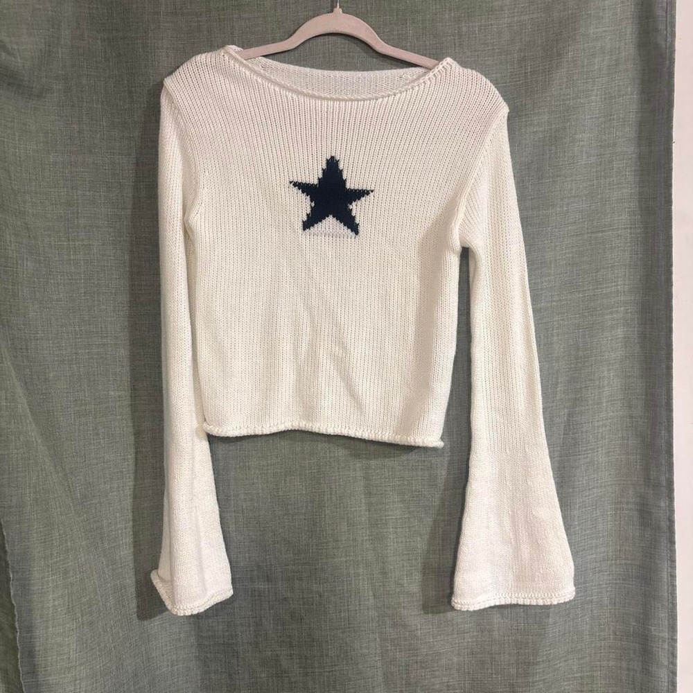 White cropped crochet style sweater with black star